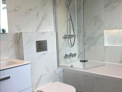 Refitted bathroom with wall-hung fittings